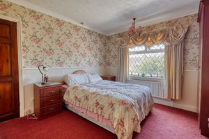 Bedroom One- click for photo gallery